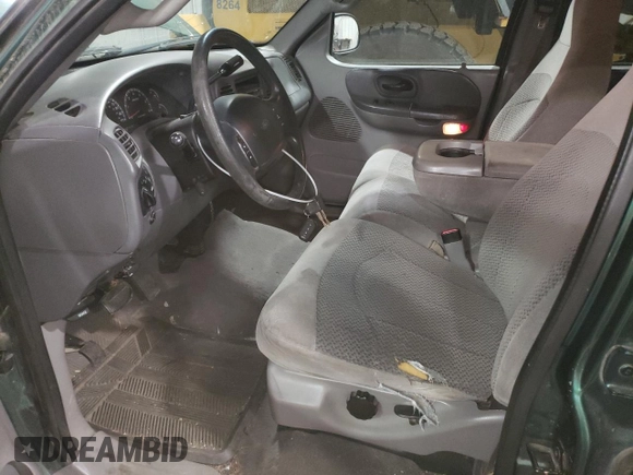 2001 Ford F-150 XLT with VIN 1FTRW08W41KD98737, listed as a Copart auction lot 64695065 with 179,158 mi miles and Clean title. Bid and sale history available at DreamBid. Image 7.