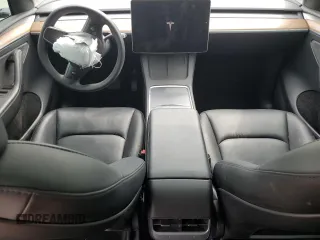 2023 Tesla Model Y Long Range z VIN 7SAYGAEE9PF686434, wystawiony jako Copart lot #54593475 z przebiegiem Nie podano mil oraz Szkoda całkowita • Salvage title. Historia ofert i sprzedaży dostępna na DreamBid. Obrazek 8.