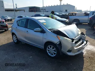 2012 Toyota Prius One z VIN JTDKDTB34C1520495, wystawiony jako IAAI lot #42398129 z przebiegiem 254 352 mil mil oraz . Historia ofert i sprzedaży dostępna na DreamBid. Obrazek 1.