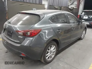 2015 Mazda 3 i Touring with VIN JM1BM1L75F1259985, listed as a IAAI auction lot 41067447 with 104,865 mi miles and . Bid and sale history available at carsss.com. Image 4.