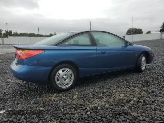 2001 Saturn SC with VIN 1G8ZR12791Z118164, listed as a Copart auction lot 74393904 with 158,308 mi miles and Salvage Title. Bid and sale history available at carsss.com. Image 3.