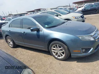 2012 Ford Fusion SEL z VIN 3FAHP0JG3CR286320, wystawiony jako IAAI lot #42159555 z przebiegiem 184 128 mil mil oraz . Historia ofert i sprzedaży dostępna na DreamBid. Obrazek 13.