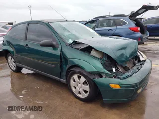 2001 Ford Focus ZX3 z VIN 3FAFP31391R108012, wystawiony jako IAAI lot #42127384 z przebiegiem 213 089 mil mil oraz . Historia ofert i sprzedaży dostępna na DreamBid. Obrazek 1.