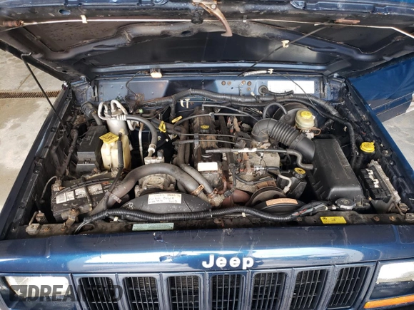 2001 Jeep Cherokee Sport with VIN 1J4FF48S81L620370, listed as a Copart auction lot 61663745 with 158,512 mi miles and Clean title. Bid and sale history available at DreamBid. Image 12.