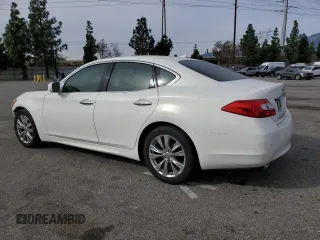 2013 Infiniti M37 with VIN JN1BY1AP6DM510258, listed as a Copart auction lot 84430924 with 136,641 mi miles and Salvage Title. Bid and sale history available at carsss.com. Image 2.