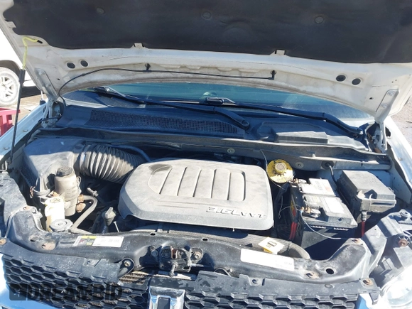 2013 Dodge Grand Caravan SE with VIN 2C4RDGBG0DR760598, listed as a IAAI auction lot 41590428 with 182,847 mi miles and . Bid and sale history available at DreamBid. Image 10.