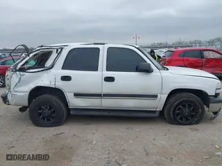 2004 Chevrolet Tahoe LT with VIN 1GNEC13Z74R313844, listed as a IAAI auction lot 41444672 with 233,620 mi miles. Bid and sale history available at carsss.com. Image 13.