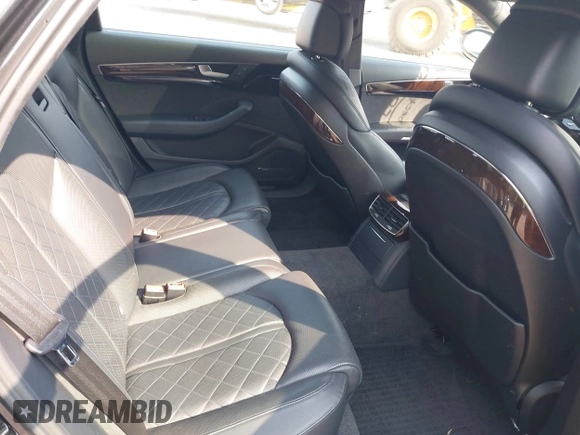 2015 Audi A8 4.0T z VIN WAU32AFD6FN031625, wystawiony jako IAAI lot #42498415 z przebiegiem 95 130 mil mil oraz . Historia ofert i sprzedaży dostępna na DreamBid. Obrazek 8.