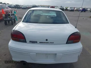 1997 Pontiac Grand Am SE with VIN 1G2NE52T3VC809661, listed as a IAAI auction lot 41100711 with 168,686 mi miles. Bid and sale history available at carsss.com. Image 16.