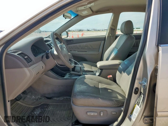 2004 Toyota Camry LE with VIN 4T1BE32K14U329066, listed as a Copart auction lot 60711515 with 178,144 mi miles and Salvage title. Bid and sale history available at DreamBid. Image 7.