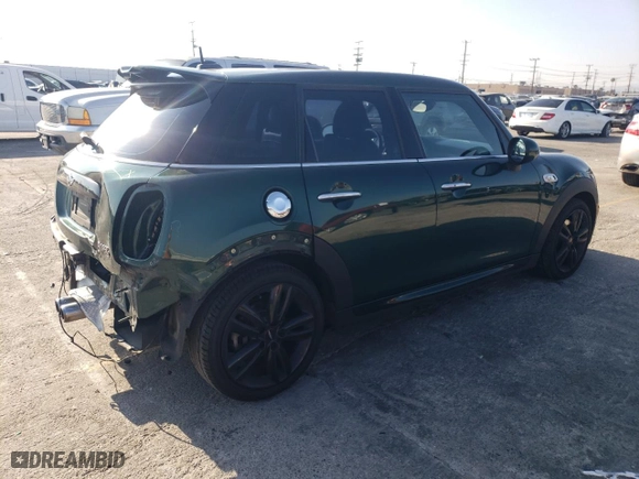 2016 MINI Cooper Hardtop 4 Door S with VIN WMWXU3C51G2D31535, listed as a Copart auction lot 42832355 with 95,458 mi miles and Salvage Title. Bid and sale history available at carsss.com. Image 3.