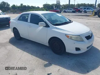 2009 Toyota Corolla z VIN JTDBL40E999061388, wystawiony jako IAAI lot #42573110 z przebiegiem 190 140 mil mil oraz . Historia ofert i sprzedaży dostępna na DreamBid. Obrazek 1.