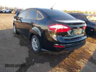 2018 Ford Fiesta SE with VIN 3FADP4BJ0JM121836, listed as a IAAI auction lot 41575608 with 74,010 mi miles. Bid and sale history available at carsss.com. Image 3.