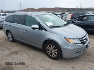 2016 Honda Odyssey EX-L with VIN 5FNRL5H67GB055805, listed as a IAAI auction lot 41970200 with 206,008 mi miles. Bid and sale history available at carsss.com. Image 1.