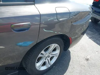 2023 Dodge Charger SXT with VIN 2C3CDXBG0PH571518, listed as a IAAI auction lot 42026774 with 47,394 mi miles and . Bid and sale history available at DreamBid. Image 6.