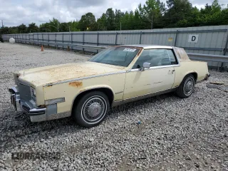 1982 Cadillac Eldorado z VIN 1G6AL5785CE607445, wystawiony jako Copart lot #55478735 z przebiegiem 64 246 mil mil oraz Tytuł czysty. Historia ofert i sprzedaży dostępna na DreamBid. Obrazek 1.