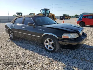 2006 Lincoln Town Car Signature z VIN 1LNHM81V96Y633439, wystawiony jako Copart lot #56548985 z przebiegiem 146 823 mil mil oraz Szkody całkowita. Historia ofert i sprzedaży dostępna na DreamBid. Obrazek 4.
