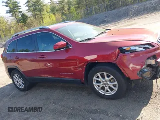 2014 Jeep Cherokee Latitude z VIN 1C4PJMCS5EW287159, wystawiony jako IAAI lot #42210599 z przebiegiem 111 945 mil mil oraz . Historia ofert i sprzedaży dostępna na DreamBid. Obrazek 13.