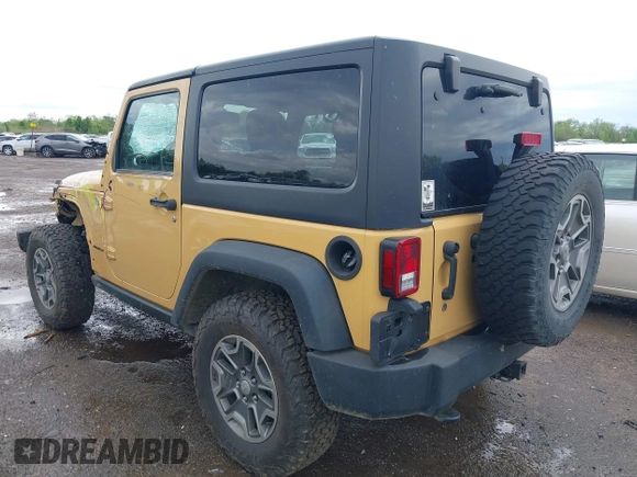 2014 Jeep Wrangler Rubicon with VIN 1C4BJWCG4EL145081, listed as a IAAI auction lot 42180723 with 113,659 mi miles and . Bid and sale history available at DreamBid. Image 3.