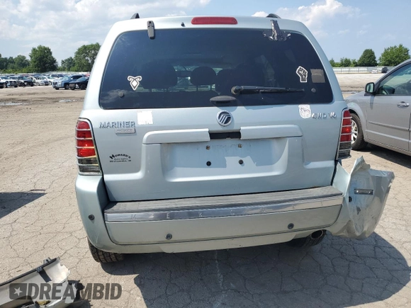 2005 Mercury Mariner Luxury z VIN 4M2YU57155DJ28005, wystawiony jako Copart lot #63460344 z przebiegiem 131 531 mil mil oraz Szkody całkowita. Historia ofert i sprzedaży dostępna na DreamBid. Obrazek 6.