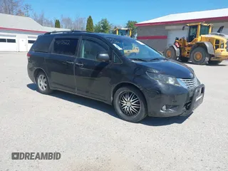 2011 Toyota Sienna XLE with VIN 5TDDK3DC8BS011975, listed as a IAAI auction lot 42112522 with 124,251 mi miles. Bid and sale history available at carsss.com. Image 1.