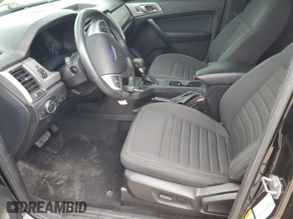2023 Ford Ranger XL with VIN 1FTER4FH5PLE32303, listed as a Copart auction lot 52417505 with 26,392 mi miles and Salvage title. Bid and sale history available at DreamBid. Image 7.