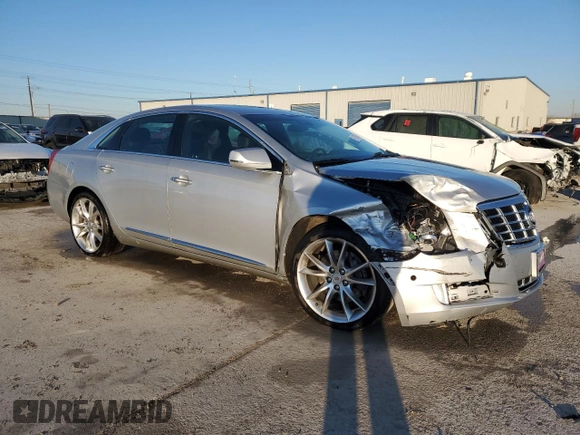 2014 Cadillac XTS Premium with VIN 2G61P5S35E9288781, listed as a Copart auction lot 41873065 with 64,936 mi miles and Salvage Title. Bid and sale history available at DreamBid. Image 4.