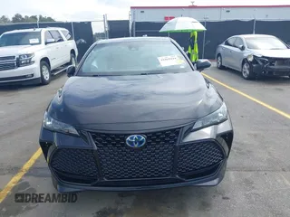 2021 Toyota Avalon Hybrid XSE z VIN 4T1EA1AB2MU002741, wystawiony jako IAAI lot #41865444 z przebiegiem 141 196 mil mil oraz . Historia ofert i sprzedaży dostępna na DreamBid. Obrazek 12.