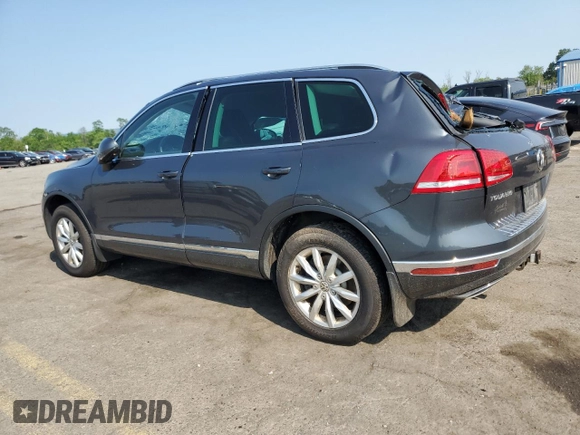 2015 Volkswagen Touareg Lux с VIN WVGEP9BP6FD003059, выставлен на аукционе Copart как лот 59670505 с пробегом 162 945 миль миль и Списание • Salvage title. История ставок и продаж доступна на DreamBid. Изображение 2.