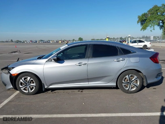 2018 Honda Civic Sedan LX with VIN 2HGFC2F52JH594332, listed as a IAAI auction lot 41854904 with 77,876 mi miles. Bid and sale history available at carsss.com. Image 15.