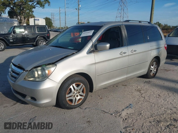 2005 Honda Odyssey EX-L with VIN 5FNRL38645B419566, listed as a IAAI auction lot 42104083 with 255,274 mi miles and . Bid and sale history available at carsss.com. Image 2.