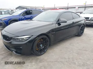 2019 BMW M4 with VIN WBS4Y9C53KAH82910, listed as a IAAI auction lot 41570315 with 59,227 mi miles. Bid and sale history available at carsss.com. Image 2.
