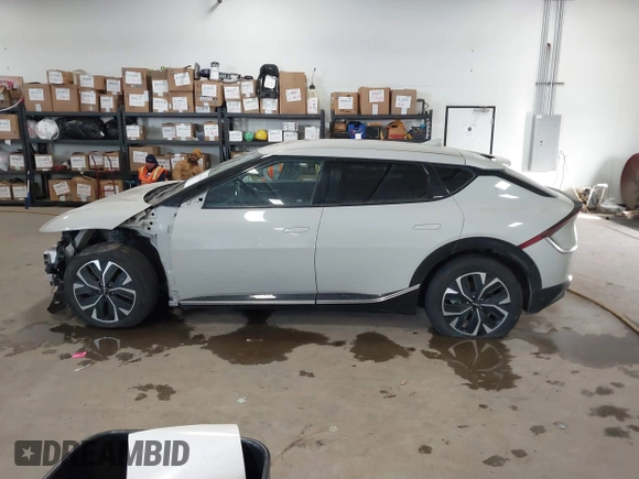 2022 Kia EV6 Wind with VIN KNDC34LA1N5028691, listed as a IAAI auction lot 41346742 with 110,944 mi miles. Bid and sale history available at carsss.com. Image 14.