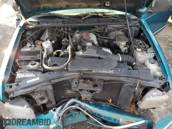 1995 Chevrolet Blazer z VIN 1GNDT13W2SK204831, wystawiony jako Copart lot #86301424 z przebiegiem 122 281 mil mil oraz Szkoda całkowita • Salvage title. Historia ofert i sprzedaży dostępna na DreamBid. Obrazek 12.