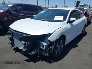 2020 Honda Civic LX with VIN 2HGFC2F67LH511473, listed as a IAAI auction lot 42614633 with 91,822 mi miles and . Bid and sale history available at DreamBid. Image 19.