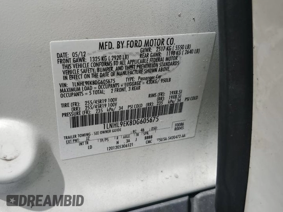 2013 Lincoln MKS with VIN 1LNHL9EK8DG605675, listed as a Copart auction lot 62448455 with 102,642 mi miles and Salvage title. Bid and sale history available at DreamBid. Image 13.