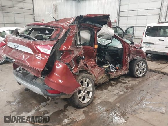 2016 Ford Escape Titanium with VIN 1FMCU9JXXGUA53238, listed as a IAAI auction lot 38472772 with Not Provided miles and . Bid and sale history available at DreamBid. Image 4.