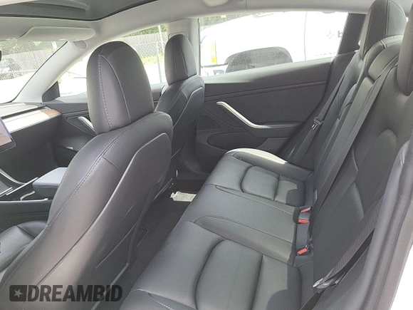 2020 Tesla Model 3 Long Range with VIN 5YJ3E1EB8LF795108, listed as a IAAI auction lot 42184414 with 30,050 mi miles and . Bid and sale history available at DreamBid. Image 1.