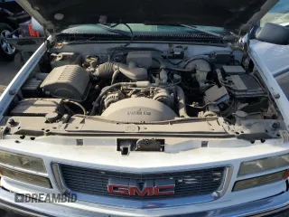 1999 GMC Suburban with VIN 3GKEC16R6XG538009, listed as a Copart auction lot 87112424 with 220,487 mi miles and Clean Title. Bid and sale history available at DreamBid. Image 12.