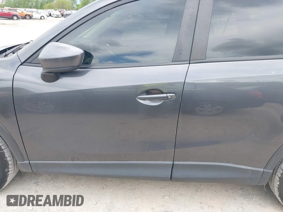 2014 Mazda CX-5 Sport z VIN JM3KE4BE6E0404753, wystawiony jako IAAI lot #42260554 z przebiegiem 144 688 mil mil oraz . Historia ofert i sprzedaży dostępna na DreamBid. Obrazek 14.
