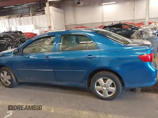 2009 Toyota Corolla with VIN 1NXBU40E19Z027256, listed as a IAAI auction lot 41383298 with 221,545 mi miles. Bid and sale history available at carsss.com. Image 14.