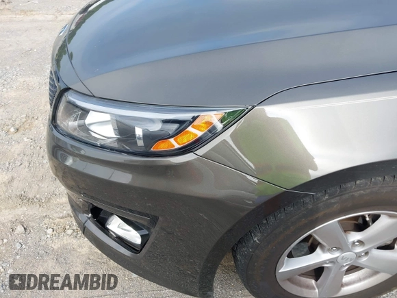 2015 Kia Optima LX with VIN 5XXGM4A77FG403664, listed as a IAAI auction lot 42471658 with 76,352 mi miles and . Bid and sale history available at DreamBid. Image 6.