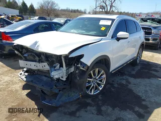 2018 Mazda CX-9 Grand Touring with VIN JM3TCADY6J0229768, listed as a IAAI auction lot 41724072 with 80,918 mi miles and . Bid and sale history available at DreamBid. Image 19.