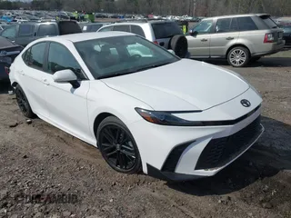 2025 Toyota Camry LE with VIN 4T1DAACK9SU084957, listed as a IAAI auction lot 41688859 with 7,396 mi miles and . Bid and sale history available at DreamBid. Image 1.