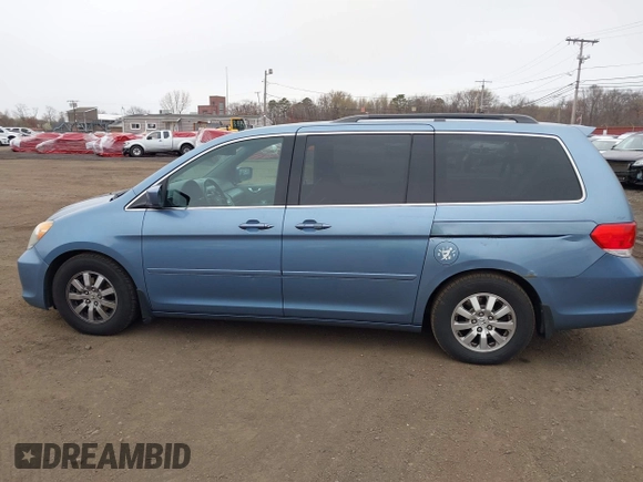 2010 Honda Odyssey EX-L with VIN 5FNRL3H79AB088793, listed as a IAAI auction lot 42008558 with 282,980 mi miles. Bid and sale history available at carsss.com. Image 14.