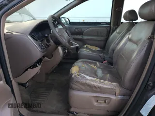 2002 Toyota Sienna LE with VIN 4T3ZF13CX2U457768, listed as a Copart auction lot 84763284 with 195,268 mi miles and Salvage Title. Bid and sale history available at carsss.com. Image 7.