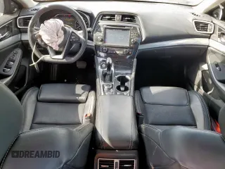 2017 Nissan Maxima SL with VIN 1N4AA6AP0HC409194, listed as a Copart auction lot 57604005 with 98,000 mi miles and Salvage title. Bid and sale history available at DreamBid. Image 8.