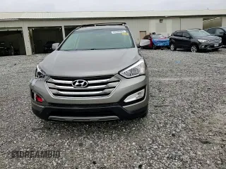 2014 Hyundai Santa Fe with VIN 5XYZU3LB1EG227984, listed as a Copart auction lot 59569905 with 102,477 mi miles and Salvage title. Bid and sale history available at DreamBid. Image 15.