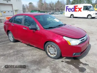 2011 Ford Focus SE with VIN 1FAHP3FN0BW139862, listed as a IAAI auction lot 41906585 with 56,774 mi miles. Bid and sale history available at carsss.com. Image 1.