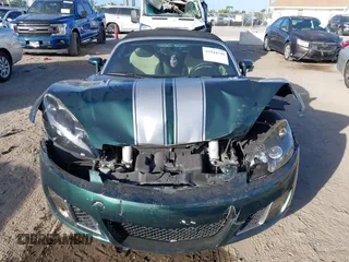 2008 Saturn Sky Red Line with VIN 1G8MF35X58Y118317, listed as a IAAI auction lot 41944739 with 106,223 mi miles. Bid and sale history available at carsss.com. Image 12.